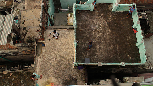group of people on top of building during daytime thumbnail