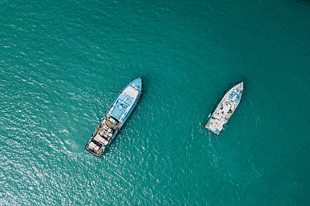 aerial view of two boats on sea thumbnail