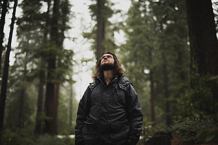 selective focus photography of man looking upwards thumbnail
