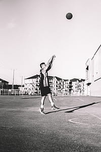 grayscale photo of man shooting ball thumbnail