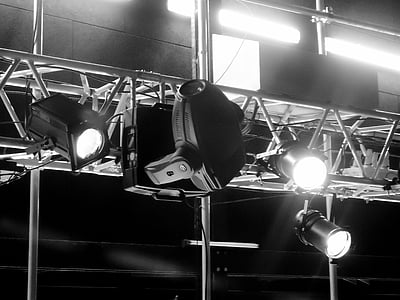 grayscale photography of turned on stage spotlights thumbnail