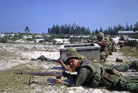 U.S. Marines with M14 rifles battle in Hamo village in Vietnam War thumbnail