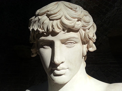 close-up photo of white man statue thumbnail