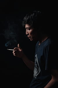 photo of man smoking cigarette thumbnail