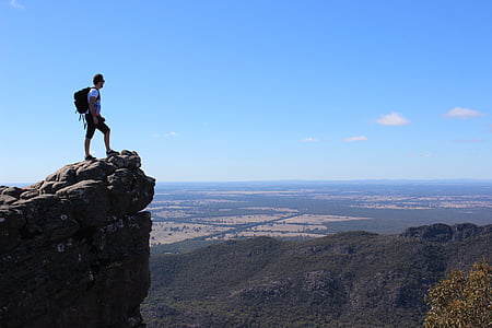man on top of hill thumbnail