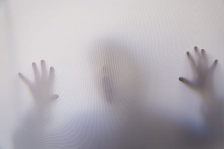 photo of person leaning on glass thumbnail
