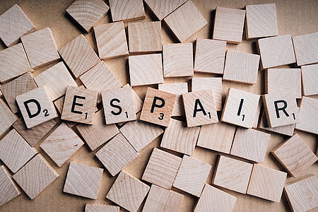 despair text printed brown wooden boards thumbnail