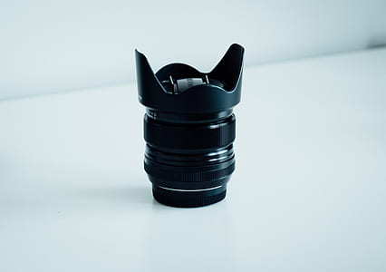 black DSLR camera zoom lens thumbnail