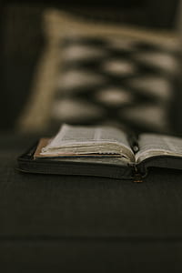 selective focus photography of opened bible thumbnail