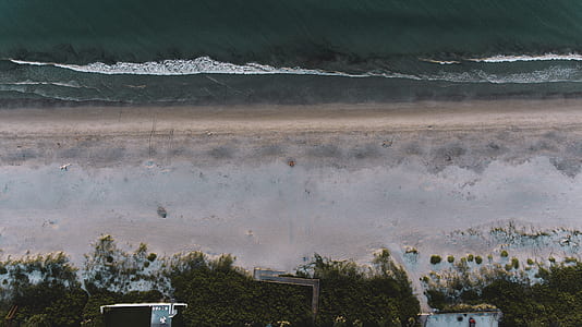 aerial view of seashore during daytime thumbnail