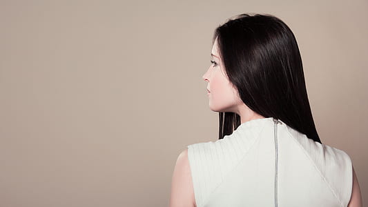 woman wearing white sleeveless shirt thumbnail