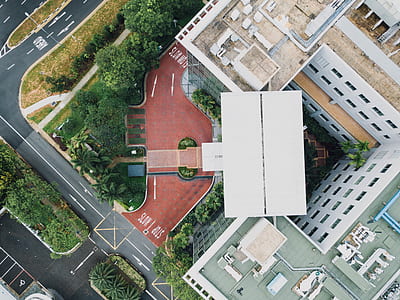 aerial photography of white concrete building thumbnail