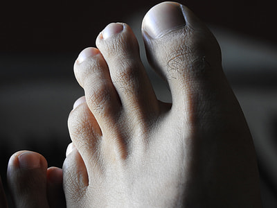 close up photography of left foot thumbnail