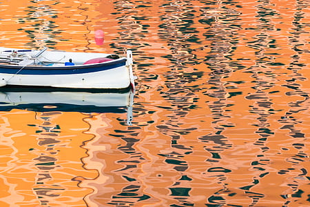 close-up photography of white boat during daytime thumbnail