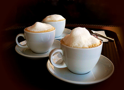 three teacup on saucer with coffee filled thumbnail