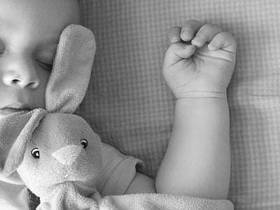 baby sleeping grayscale photo thumbnail