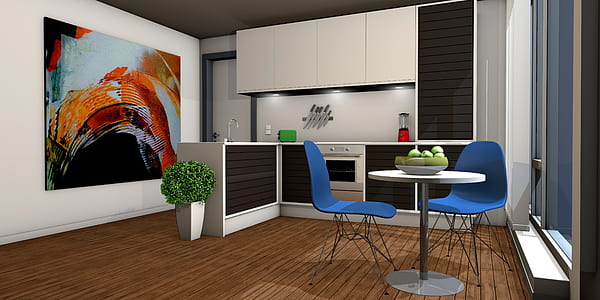 round white table beside a chairs inside a room thumbnail