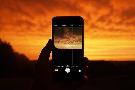 silhouette photo of orange sky during golden hour thumbnail