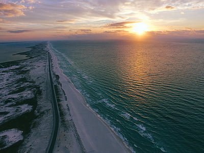 oil in the middle of ocean during sunset thumbnail
