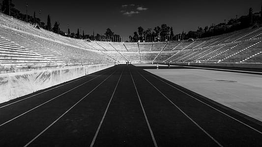 grayscale photo of track field thumbnail