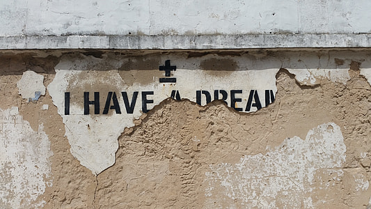 brown and gray concrete wall with I Have A Dream painting thumbnail