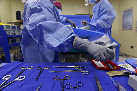 doctors wearing gown inside room operation thumbnail