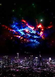 city buildings under blue and red skies thumbnail
