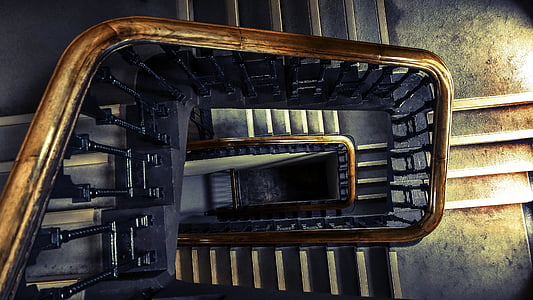high angle view of spiral stairs thumbnail