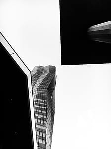 Grayscale Photo of Glass Curtain High Rise Building thumbnail