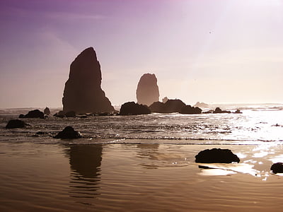 rock formation near seashore at daytime thumbnail