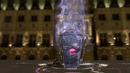 selective focus photography of clear glass vase with smoke thumbnail