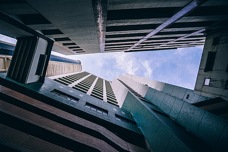 low angle photography of high rise buildings thumbnail