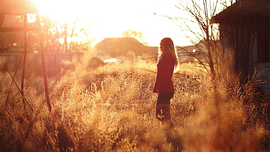 silhouette of woman during sunset thumbnail