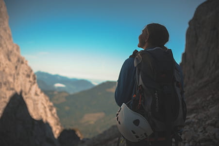 woman standing on mountain thumbnail