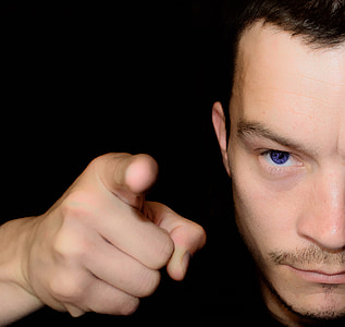 man pointing index finger thumbnail
