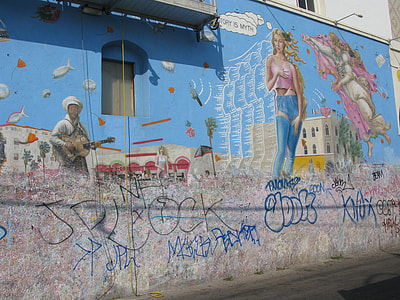 multicolored wall graffiti art at daytime thumbnail