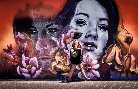 woman wearing hat with portrait and flowers painting thumbnail