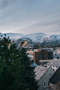 aerial photo of houses in winter time at daytime thumbnail