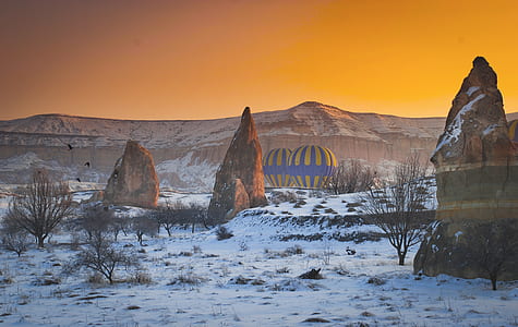 mountain near two hot air balloons thumbnail