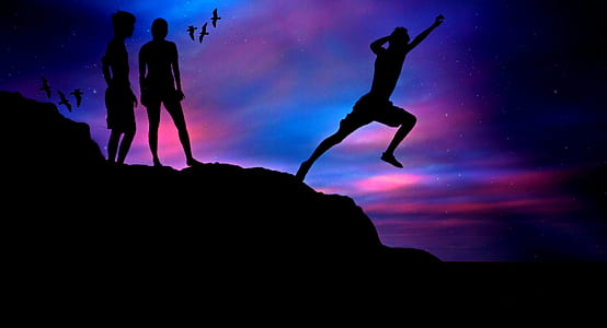 silhouette of man jumping on hill thumbnail