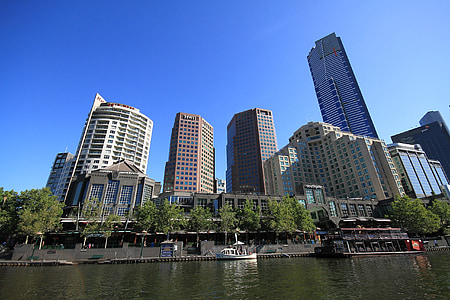city buildings under blue sky thumbnail