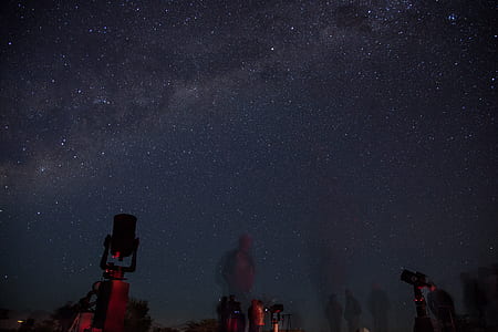 black telescopes during night thumbnail