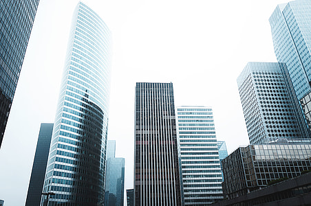 assorted buildings during fog thumbnail