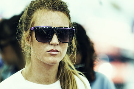 woman wearing black and purple sunglasses thumbnail