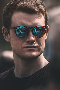 man wearing brown sunglasses thumbnail