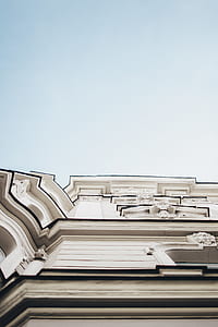 low-angle photography of white wall paint building thumbnail