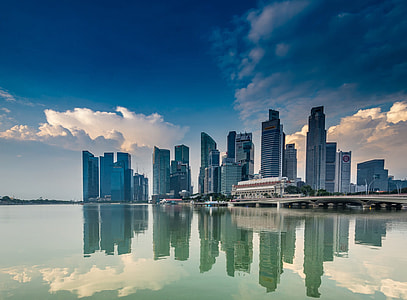 high-rise building near body of water thumbnail
