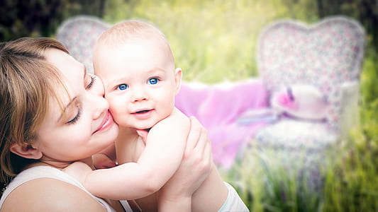 woman holding topless baby thumbnail