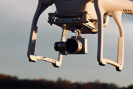 white quadcopter drone thumbnail