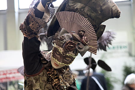 woman performing dance in mask costume thumbnail